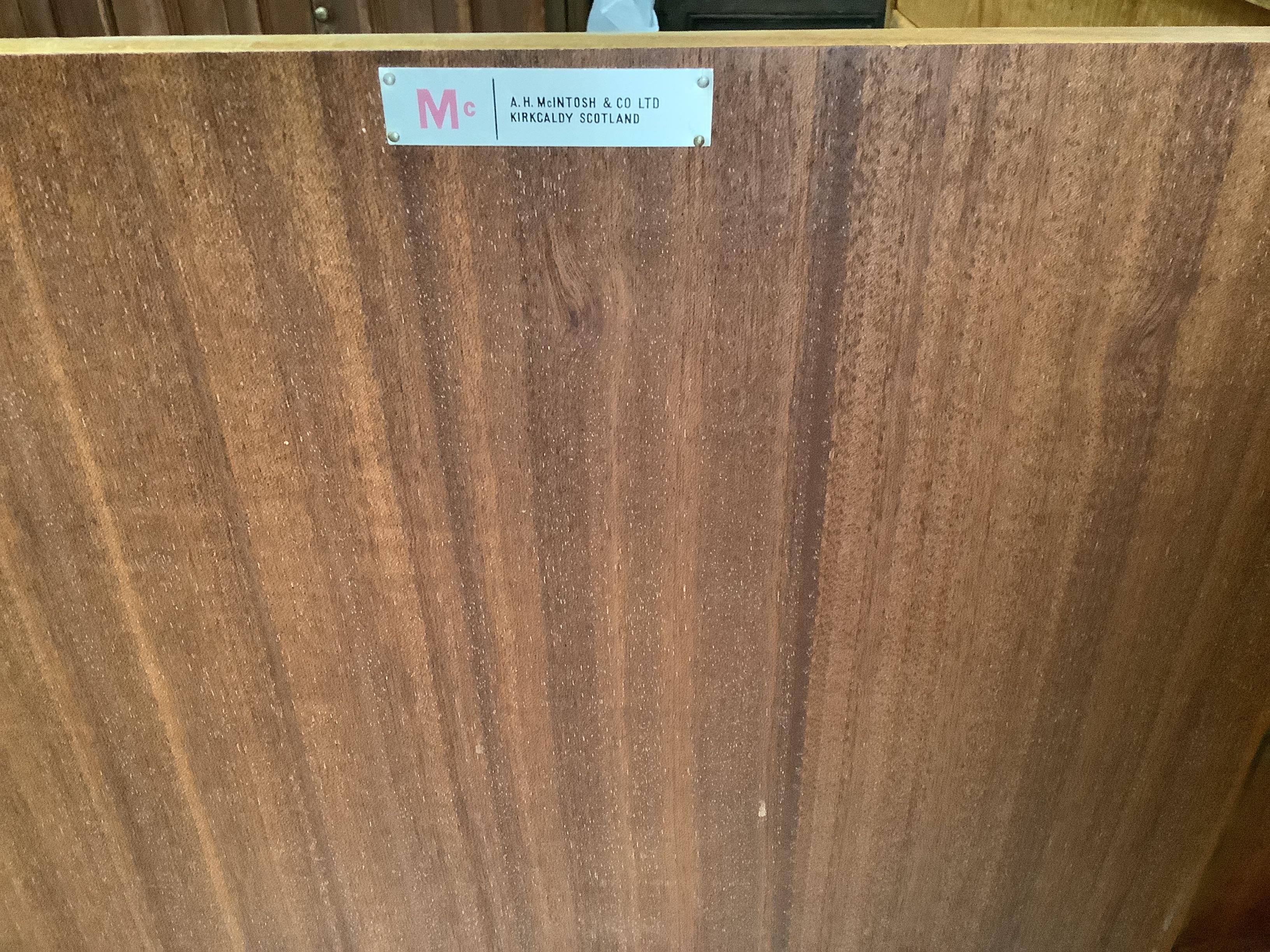 McIntosh of Kirkcaldy, a mid century teak dining suite comprising sideboard, width 213cm, depth 47cm, height 75cm, extending dining table and four chairs